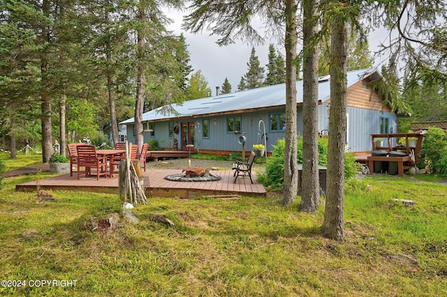 rear view of house with a deck