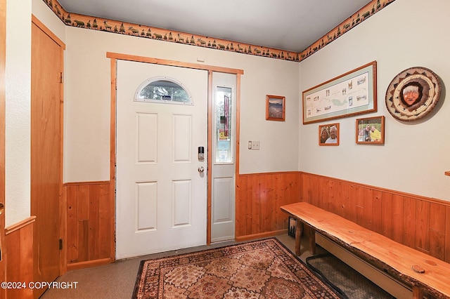 entrance foyer with wood walls