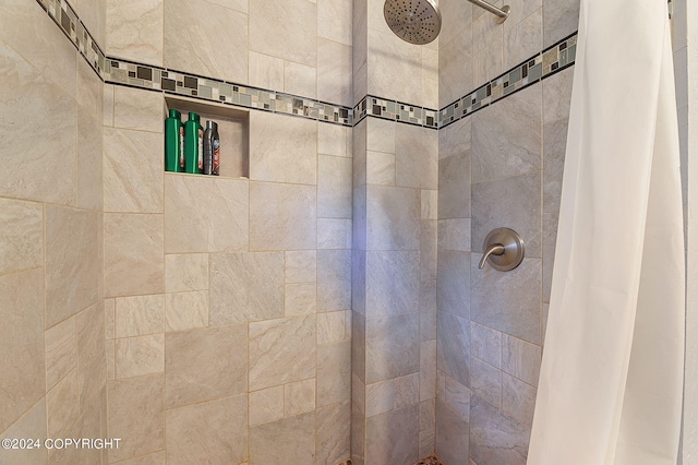 bathroom with curtained shower