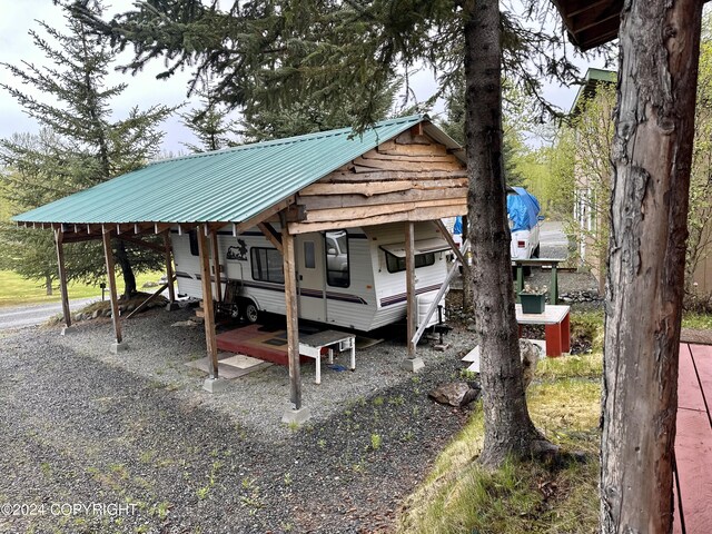 view of outdoor structure featuring a carport