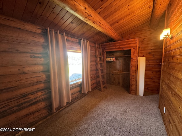 unfurnished bedroom featuring carpet flooring, wooden walls, and wood ceiling