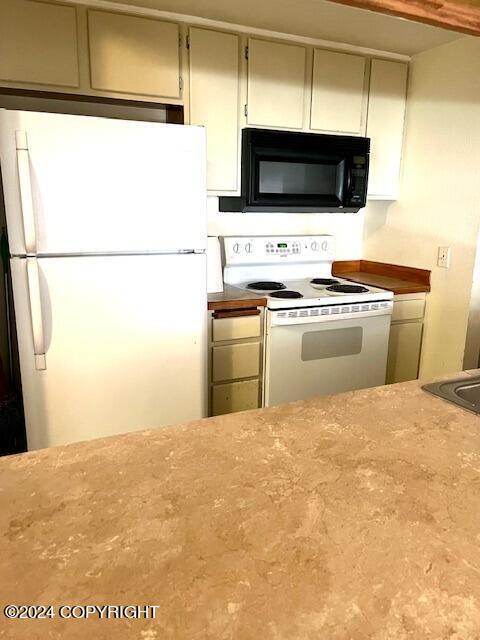 kitchen featuring white appliances