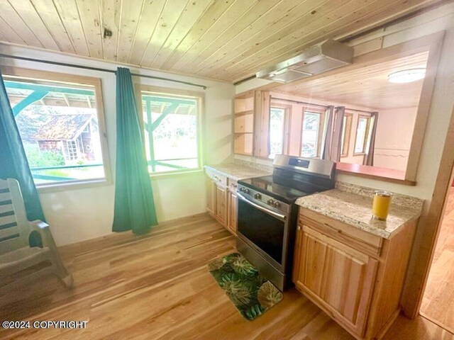 kitchen with stainless steel electric range oven, light stone countertops, light hardwood / wood-style floors, and wooden ceiling