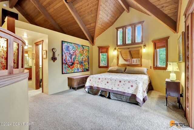 bedroom with connected bathroom, beam ceiling, high vaulted ceiling, wood ceiling, and light colored carpet