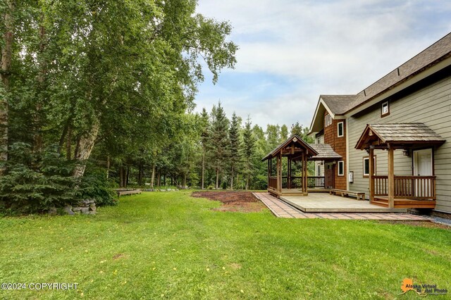 view of yard with a deck