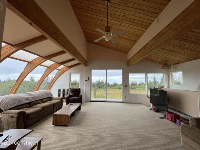 living room with beam ceiling, high vaulted ceiling, ceiling fan, baseboard heating, and light carpet