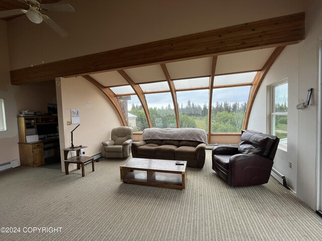 living room with vaulted ceiling with beams, carpet floors, baseboard heating, and ceiling fan