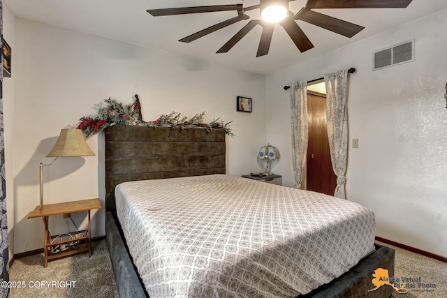 carpeted bedroom with ceiling fan