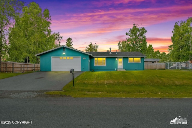 12230 Rainbow Ave, Anchorage, AK 99516 - ranch-style home featuring driveway and an attached garage