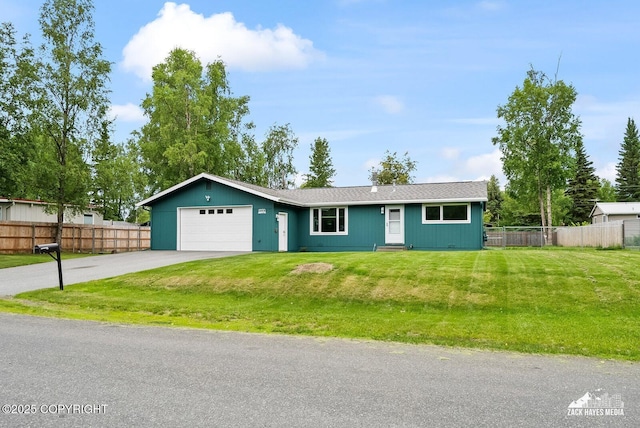 12230 Rainbow Ave, Anchorage, AK 99516 - ranch-style home featuring a garage and asphalt driveway