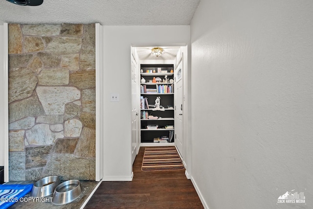 12230 Rainbow Ave, Anchorage, AK 99516 - hall featuring wood finished floors and a textured ceiling