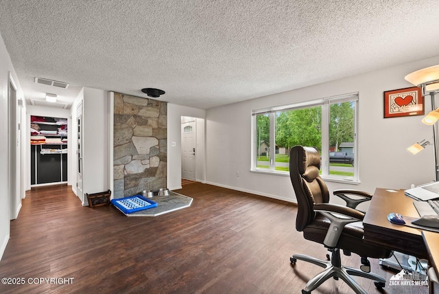 12230 Rainbow Ave, Anchorage, AK 99516 - office featuring wood finished floors, a textured ceiling, and a fireplace