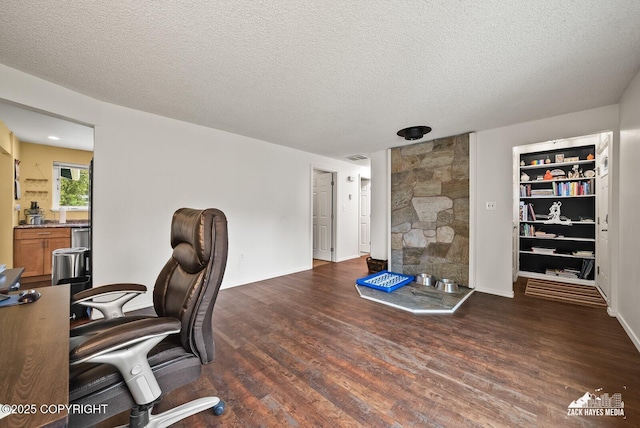 12230 Rainbow Ave, Anchorage, AK 99516 - office area featuring wood finished floors and a textured ceiling