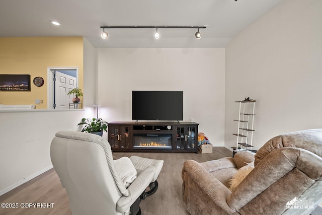 12230 Rainbow Ave, Anchorage, AK 99516 - living area with wood finished floors and rail lighting