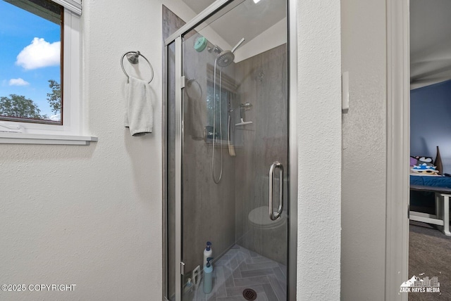 12230 Rainbow Ave, Anchorage, AK 99516 - bathroom with a shower stall and a textured wall