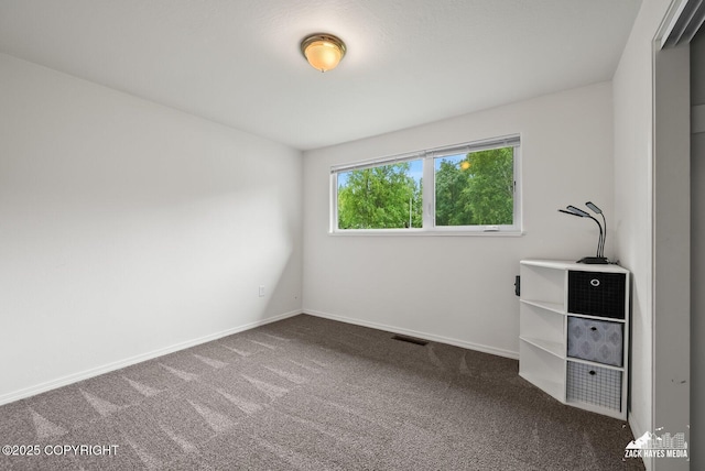12230 Rainbow Ave, Anchorage, AK 99516 - unfurnished bedroom with carpet and baseboards