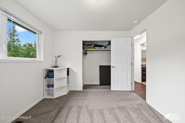 12230 Rainbow Ave, Anchorage, AK 99516 - unfurnished bedroom featuring carpet floors and a closet