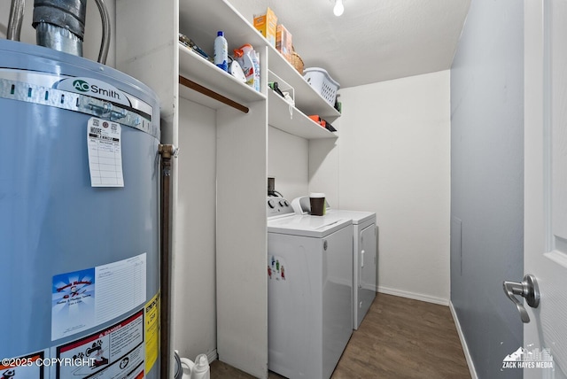 12230 Rainbow Ave, Anchorage, AK 99516 - washroom featuring water heater, independent washer and dryer, and wood finished floors