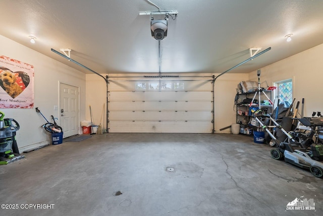 12230 Rainbow Ave, Anchorage, AK 99516 - garage with a garage door opener