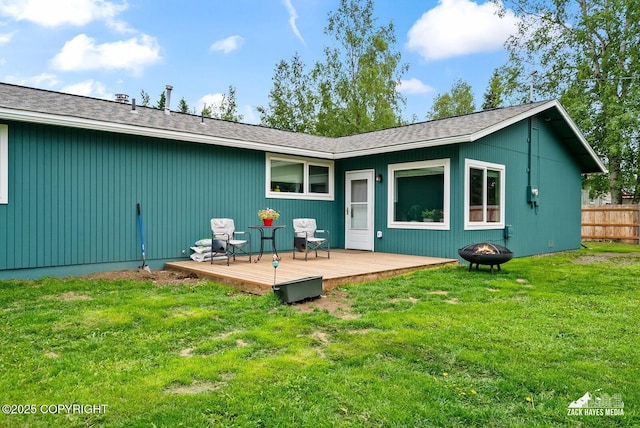 12230 Rainbow Ave, Anchorage, AK 99516 - rear view of house with a fire pit and a deck