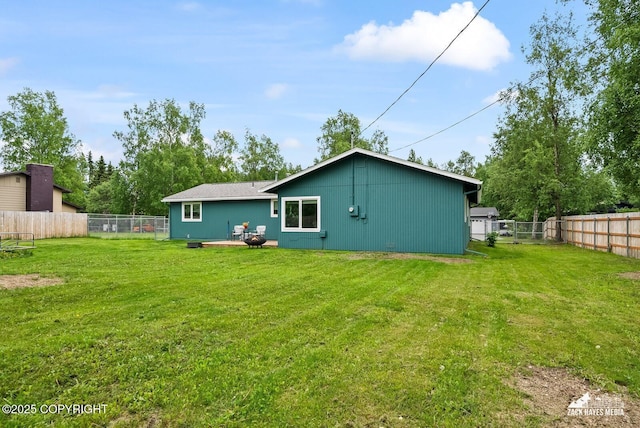 12230 Rainbow Ave, Anchorage, AK 99516 - rear view of house featuring a fenced backyard
