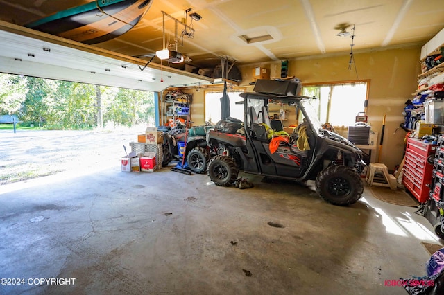 garage featuring a garage door opener