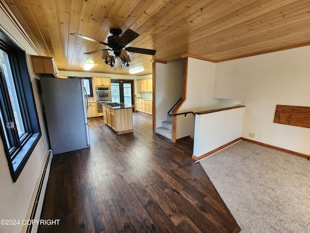 kitchen featuring ceiling fan, dark wood-type flooring, wooden ceiling, a baseboard heating unit, and double oven