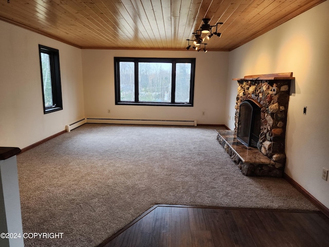 unfurnished living room with hardwood / wood-style floors, a baseboard radiator, a stone fireplace, and wood ceiling