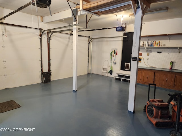 20527 Mark Cir, Chugiak, AK 99567 - garage with a garage door opener