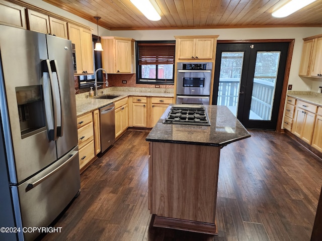 kitchen with stainless steel appliances, dark wood-type flooring, sink, wooden ceiling, and hanging light fixtures