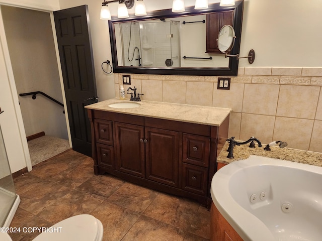 full bathroom with shower with separate bathtub, vanity, and toilet