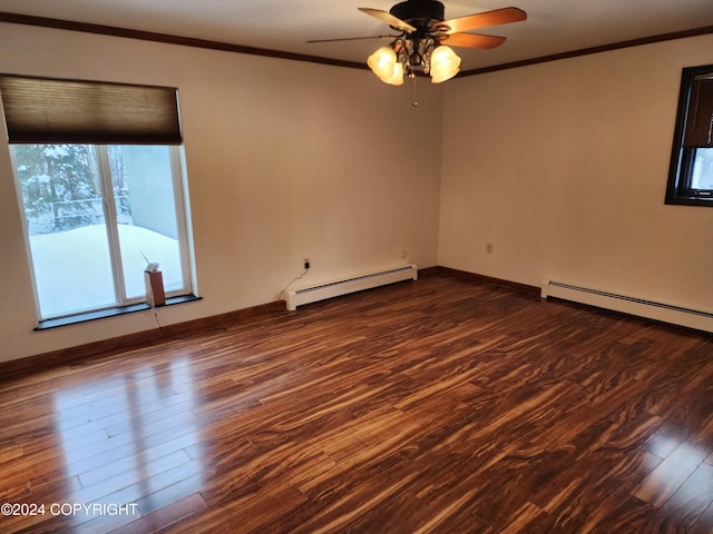 spare room with crown molding, ceiling fan, a baseboard radiator, and dark hardwood / wood-style floors