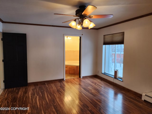 spare room with ceiling fan, dark hardwood / wood-style flooring, crown molding, and a baseboard radiator