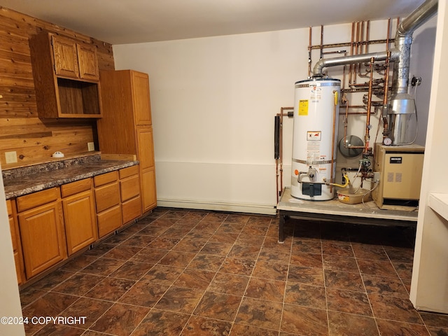 utility room with gas water heater