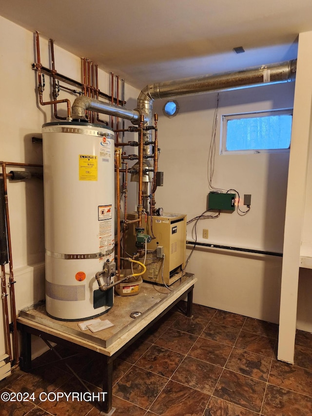 utility room featuring gas water heater