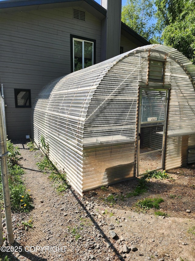 20527 Mark Cir, Chugiak, AK 99567 - view of side of property with a chimney