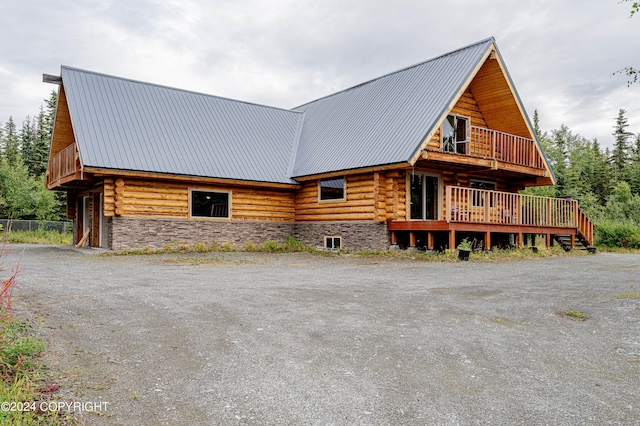 view of front of property with a deck