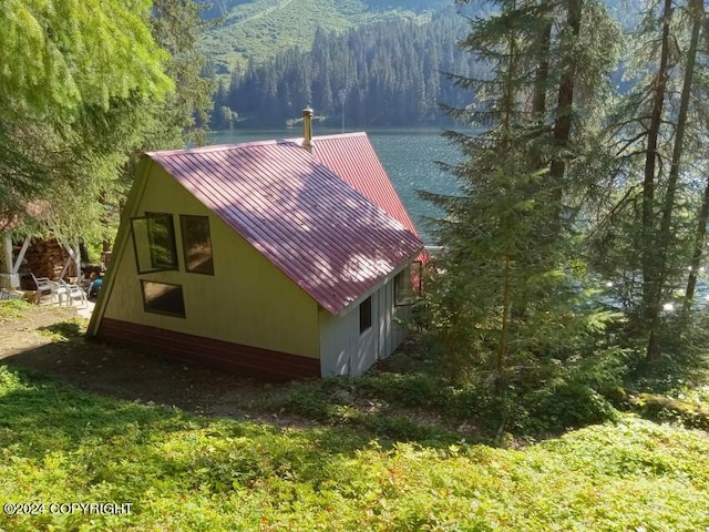 view of home's exterior featuring a mountain view