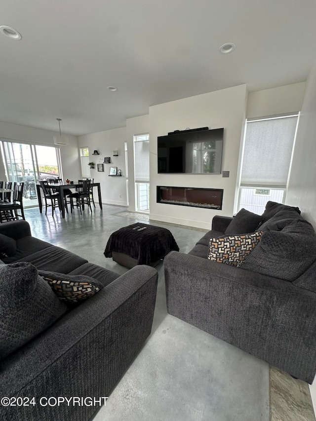 living room with concrete floors