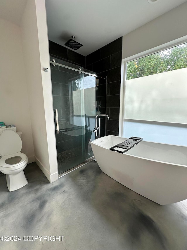 bathroom with separate shower and tub, concrete flooring, and toilet