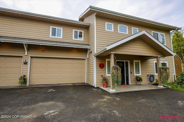 view of property featuring a garage