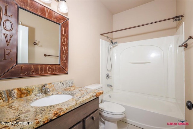 full bathroom with tile patterned floors, toilet, tub / shower combination, and vanity