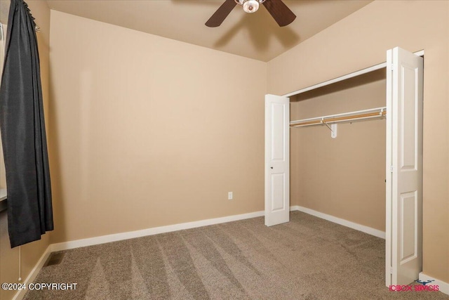 unfurnished bedroom with a closet, ceiling fan, and light colored carpet