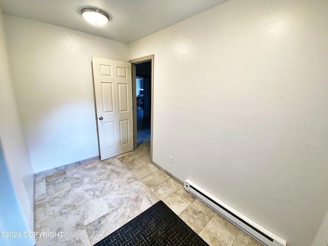 interior space featuring baseboard heating