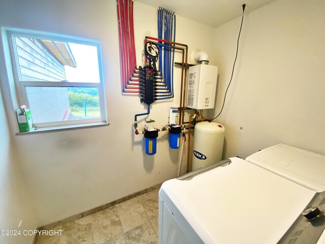 laundry area with washing machine and dryer