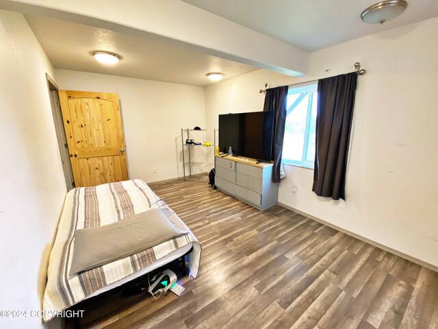 bedroom featuring hardwood / wood-style flooring