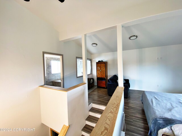 interior space with wood-type flooring and lofted ceiling