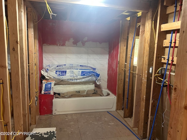 bathroom featuring a washtub