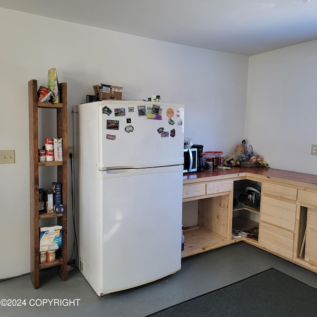 kitchen featuring white refrigerator