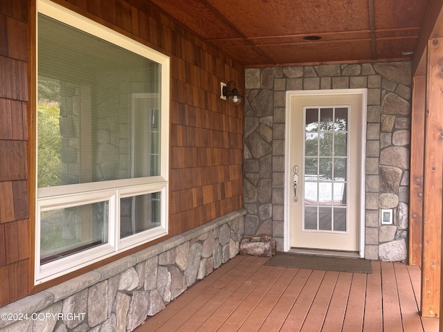 view of exterior entry with stone siding